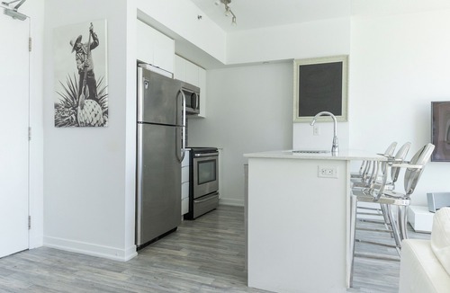 King West Village Apartment | Loft in Liberty Village (Steps to Major International Sporting Event Stadium)