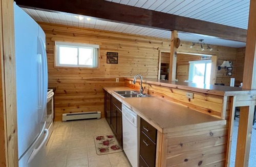 Cheboygan House | Lovely Chalet Home on Quiet Bay with Sandy Beach