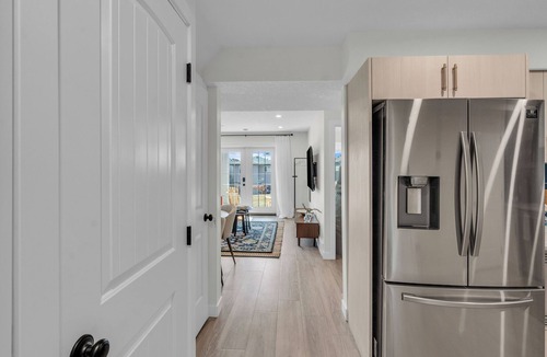 Calgary House | Luxury Suite: King Bed, Workspace, Huge Lawn & Epic Sunset