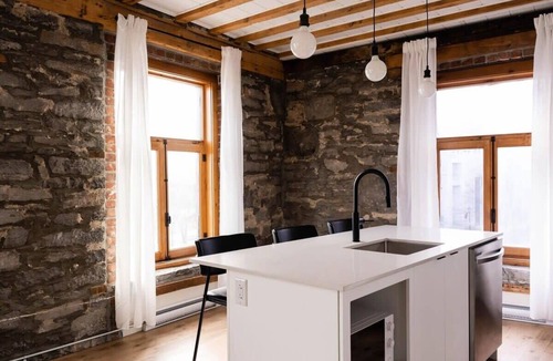Old Montreal Apartment | Maison Place Royale Luxury Waterfront Two-Bedrooms Apartment Old Montreal Water View St. Lawrence River Full Kitchen Stone Walls Wi-Fi AC
