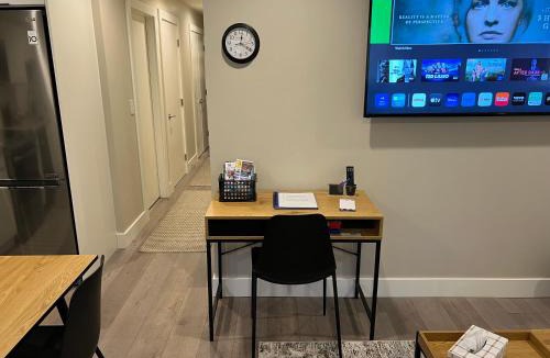 Lower Lonsdale Apartment | Modern Private 1 Bedroom Suite - Assigned Parking and Patio