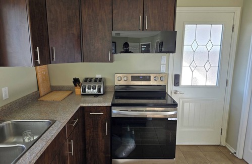 Victoria Apartment | Mountain House: An apartment with a gorgeous ocean view on Triangle Mountain.