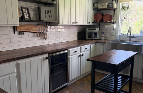Painesville House | Nature and Wine Lover’s Paradise—5BR Home with Hot Tub, Sauna & Creek.