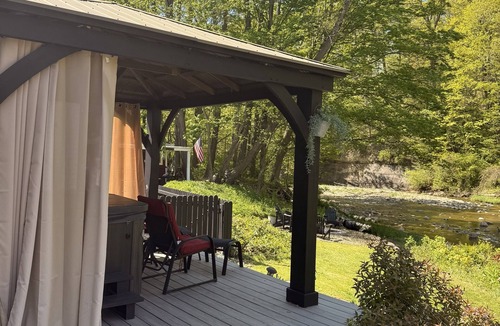 Painesville House | Nature and Wine Lover’s Paradise—5BR Home with Hot Tub, Sauna & Creek.