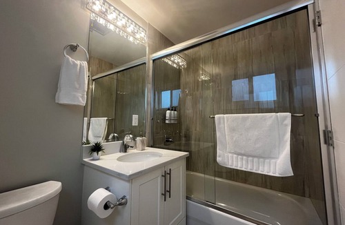 Deep Cove Apartment | Newly renovated modern home away from home. Steps away from Deep cove strip.