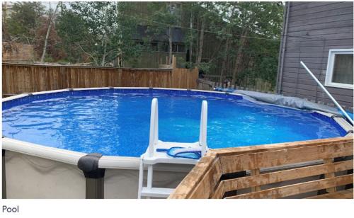 Yellowknife House | NHP YK B&B - Large Deck- Hot Tub - Massage chair and seasonal swimming pool- Free parking - Pet friendly