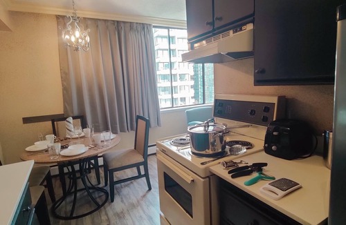 West End Hotel | One Bedroom Apartment with Robson View