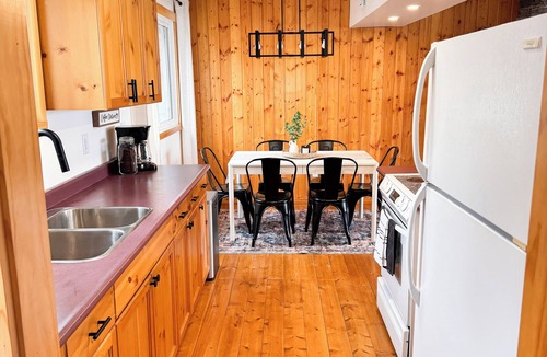 Westerose Cabin | Pine Haven: Cozy Lakefront Escape with Private Beach & Hot Tub
