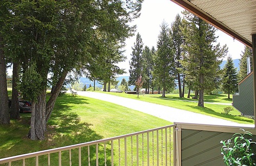 Windermere House | Private beach and lake access at Windermere Lake. NEW POOL AND HOT TUB NOW OPEN!