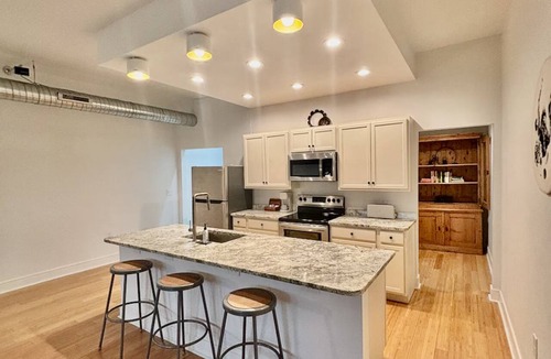 Lockport Apartment | Private Cinematic Loft, Café Downstairs, Quiet Workspace with 1.5 Bath