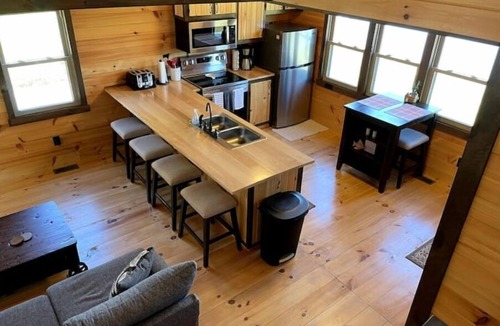 Norwalk Cabin | Private Lakefront Cabin with Hot Tub, Beach and Room for 10