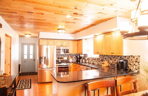 Munising House | Private Lakefront Escape - Dock, Kayaks, Boat Launch & Sunset Views