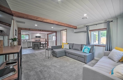 Prudenville Cottage | Prudenville Retreat w/ Yard ~ 1 Mi to Lake!