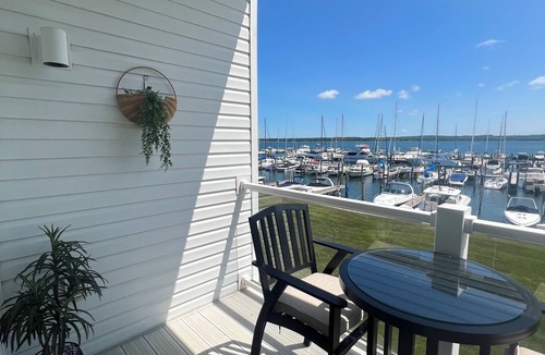 Charlevoix Condo | Relax in this beautiful condo on Lake Charlevoix!
