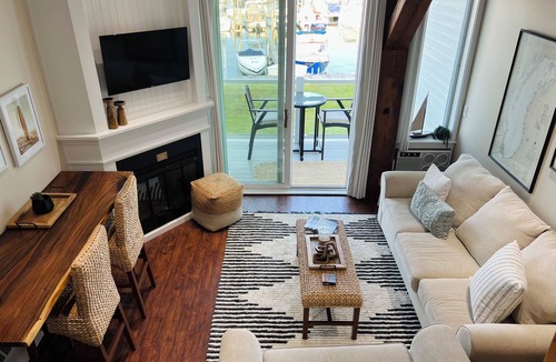 Charlevoix Condo | Relax in this beautiful condo on Lake Charlevoix!