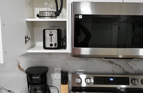 Leduc County House | Relax in this calm, spacious, stylish space featuring top-of-the-line appliances