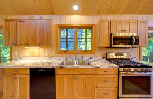 Edray Cabin | Riverfront West Virginia Cabin w/Screened-In Deck