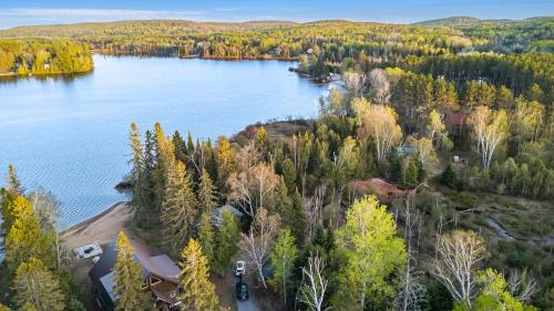 Lake St. Peter House | Rustic Waterfront Cabin with BBQ, Fire Pit and Views