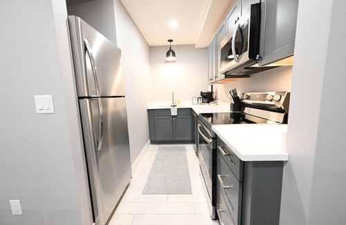 Mancelona Condo | Schuss Mountain. 2 bedroom, 1.5 bath Sleeps 6. Pool Dog Friendly boat parking