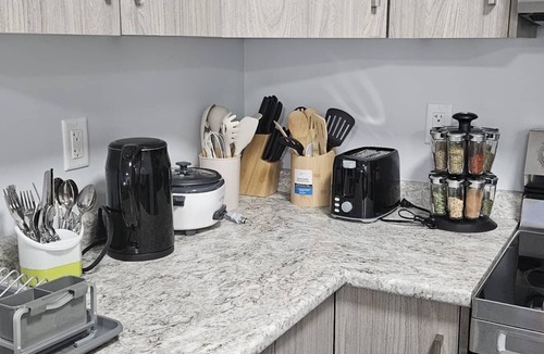 Saskatoon House | Serene cozy and comfortable suite providing home away from home experience.