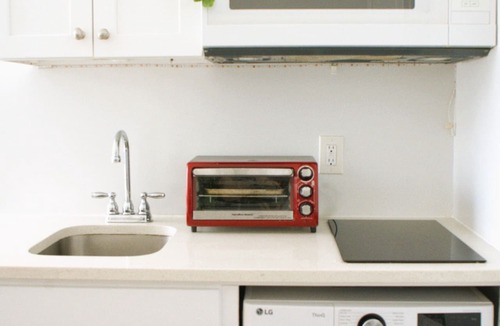 Queens Apartment | Serene Studio in Flushing on Main St with Free On-Site Parking and Laundry