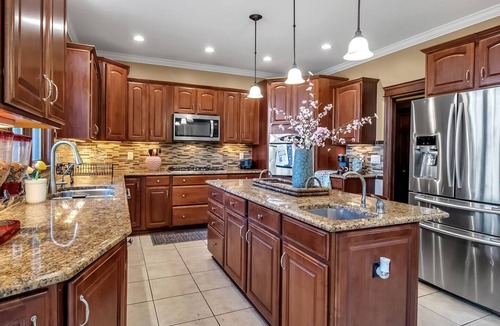 Amherst House | Spacious 4-Bedroom Lakefront Home| Fenced Yard|Nr UB & I-990| Ideal for Families