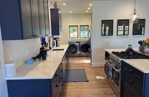 Suttons Bay House | Spacious 5-bedroom farmhouse in lovely Omena, MI with AC, WiFi & lake views