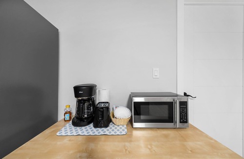 Montgomery House | Spacious basement 2 bedroom suite with private kitchenette and bathroom