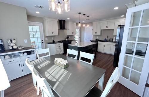 Schenectady House | Spacious Glenville Ranch Chef's Kitchen Near Everything Deck Fire Pit
