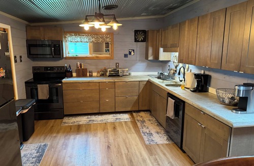 Deckerville Cottage | Stones Throw Cottage - Beautiful beach within 2 miles of both major campgrounds