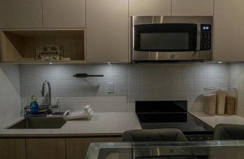 The Queensway Apartment | Stylish New 1BR in Toronto with Fast WiFi and Private Workspace