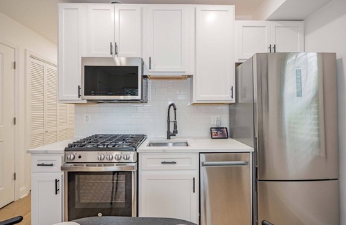 Northeast Apartment | Sunny, Chic, Centrally Located 2 bedroom, with Parking & Alexa