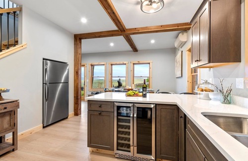 Bryant Pond Cabin | Sweeping mountain and water views from a top a mountain side
