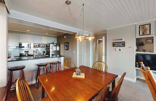 Maple City Condo | Tasteful Glen Arbor condo with beautiful Lake Michigan views, deck & fireplaces