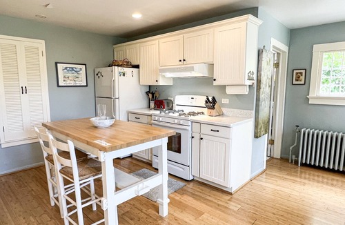 Wequetonsing Cottage | The Castle Cottage - 63 Beach - Weque - Private Lake Access