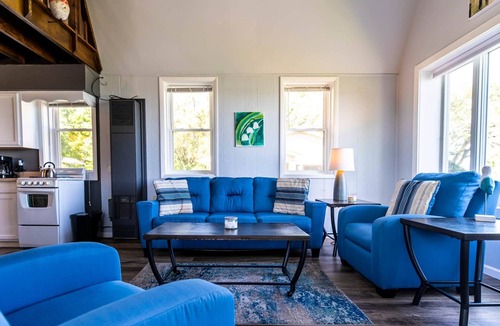 Huron House | The Depot Lakefront historic train depot King loft