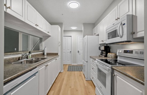 Radium Hot Springs Condo | The Radium Rise | Outdoor Pool/Hot Tub | Balcony