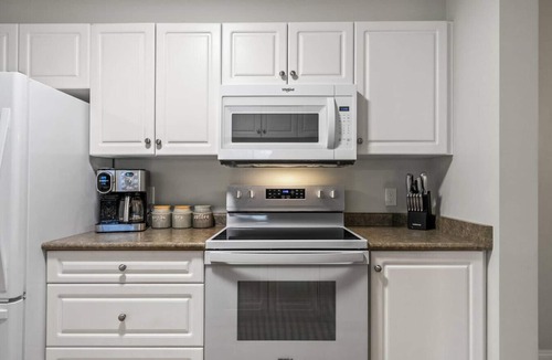 Radium Hot Springs Condo | The Radium Rise | Outdoor Pool/Hot Tub | Balcony