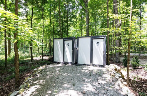 Dola RV Rental | Three Cozy Cabin Retreats nestled in nature