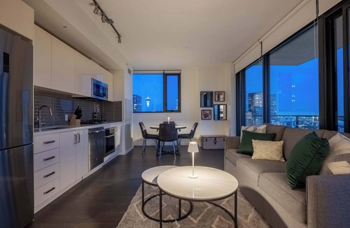 Connaught Condo | Tower Views! Stampede, Pool, FREE Banff Pass!