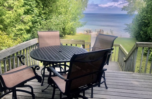Suttons Bay House | "Up north" waterfront lodge on West Bay. Spacious deck with gas grill.