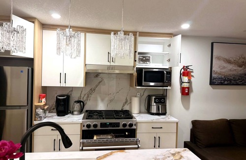Southwest Calgary Apartment | Upscale Basement Suite - Private Entry Sleeps 4.