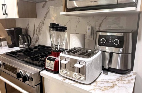 Southwest Calgary Apartment | Upscale Basement Suite - Private Entry Sleeps 4.