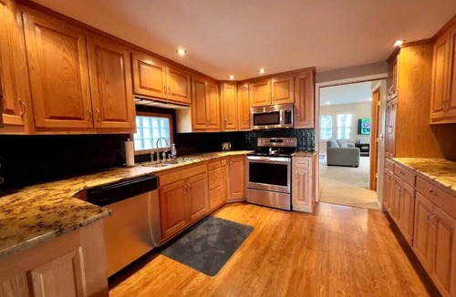 Russells Point Cottage | Waterfront Cabin: Hot Tub, Game Room & Fire Pit