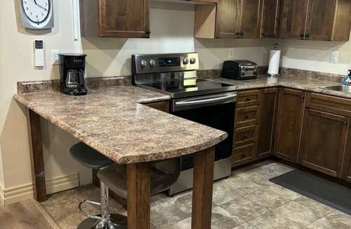 Memramcook Apartment | Welcome to your urban escape with HOT TUB!