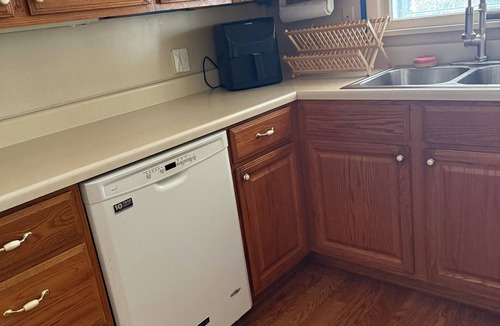 Toledo House | Wonderful 2 bedroom house with AC in charming Point Place. Families welcome.