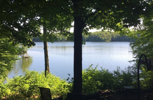 Bliss RV Rental | Woodsy campground , trails, pool, hot tub, showers , beach , play ground, movies
