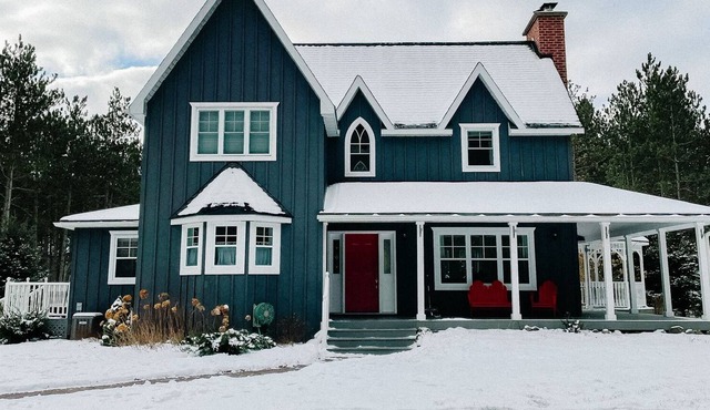 A country home minutes from Creemore with an inground pool and hot tub.