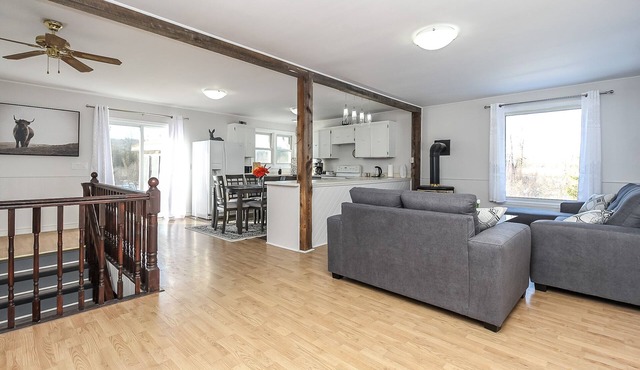 A cozy family retreat surrounded by trees, Nature, comfort and family memories.