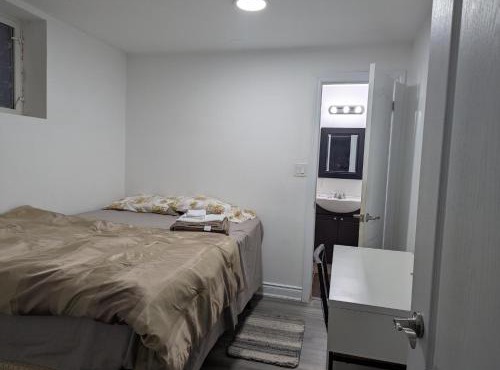 Basement two Queen beds and one single with two full washrooms by YKF airport